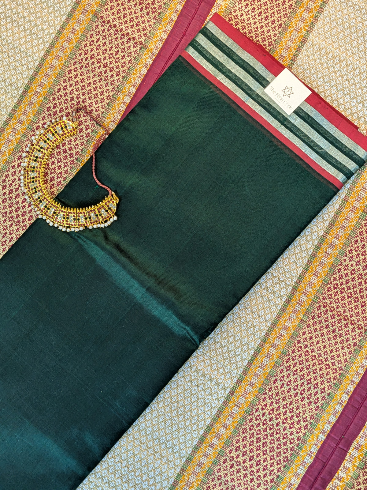 Paturu Plain Geometric Border Saree